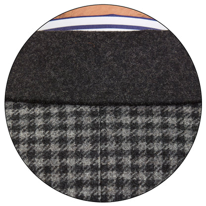 Detalle cuello de abrigo formal color gris con patrón clásico y camisa a rayas, ideal para invierno o eventos ejecutivos.