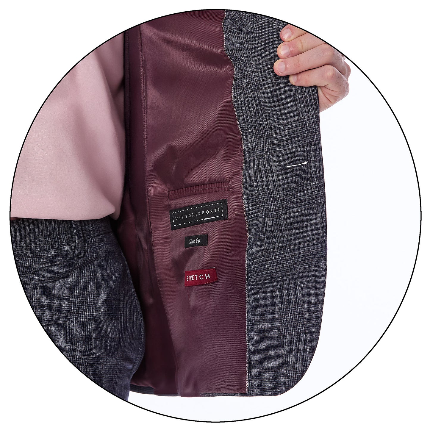 Interior del saco del traje Vittorio Forti , mostrando forro satinado y etiqueta bordada de la marca.
