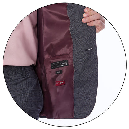 Interior del saco del traje Vittorio Forti , mostrando forro satinado y etiqueta bordada de la marca.
